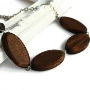 Brown chunky bead necklace. Oval wood beads.